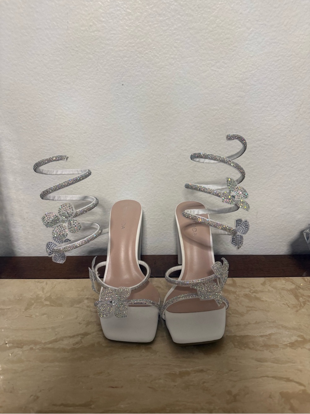 Elegant White Spiral-Strap Heeled Sandals with Crystal Flower Accents